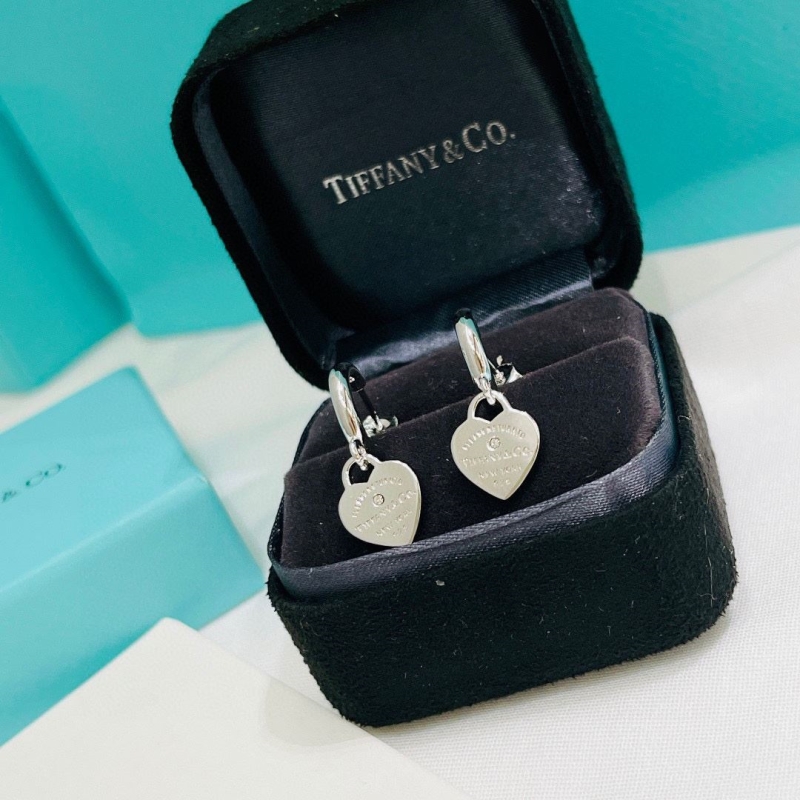 T*f*ny earrings
